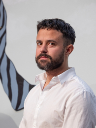 Poträttbild av Erik Lindman Mata